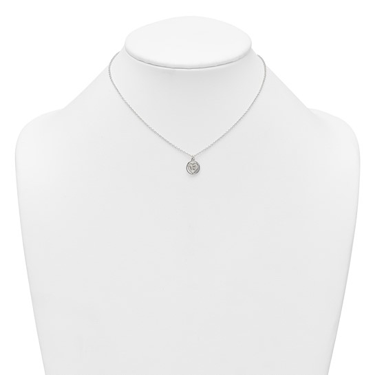 Children’s butterfly-in-heart necklace shown on display bust