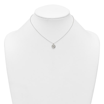 Children’s butterfly-in-heart necklace shown on display bust