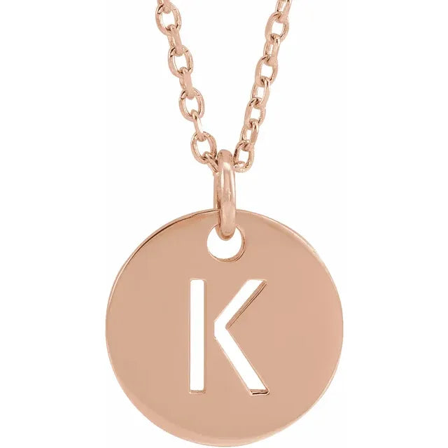 Initial disc necklace letter K in rose-gold finish
