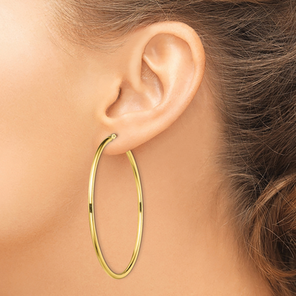 Classic 2mm gold-tone sterling silver hoop earrings, 55 mm — lifestyle view