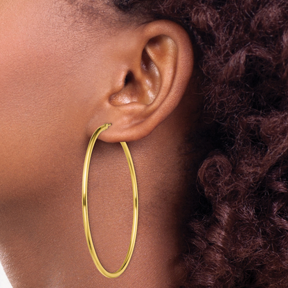 Classic 2mm gold-tone sterling silver hoop earrings, 60 mm — lifestyle view