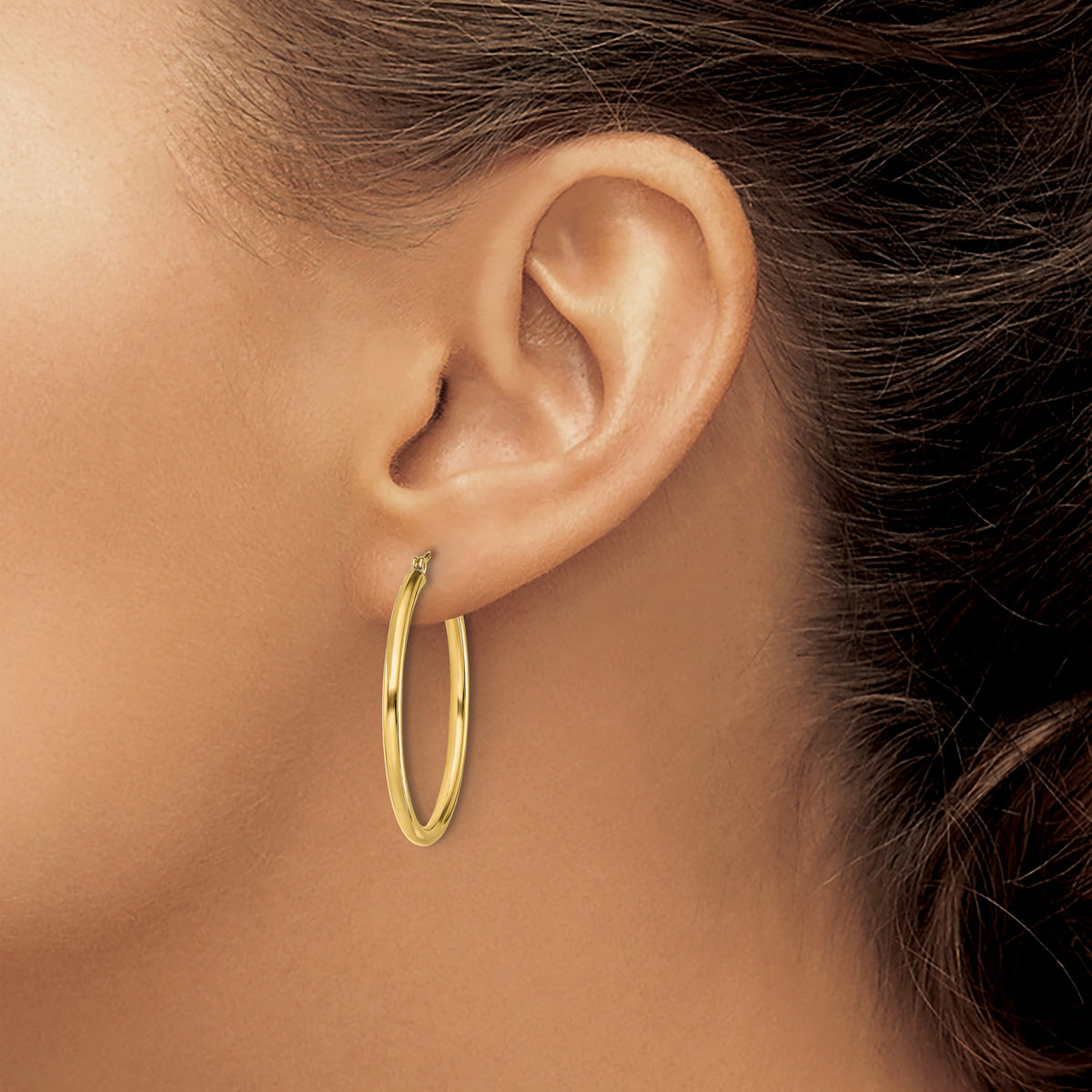 Classic 2mm gold-tone sterling silver hoop earrings, 30 mm — lifestyle view
