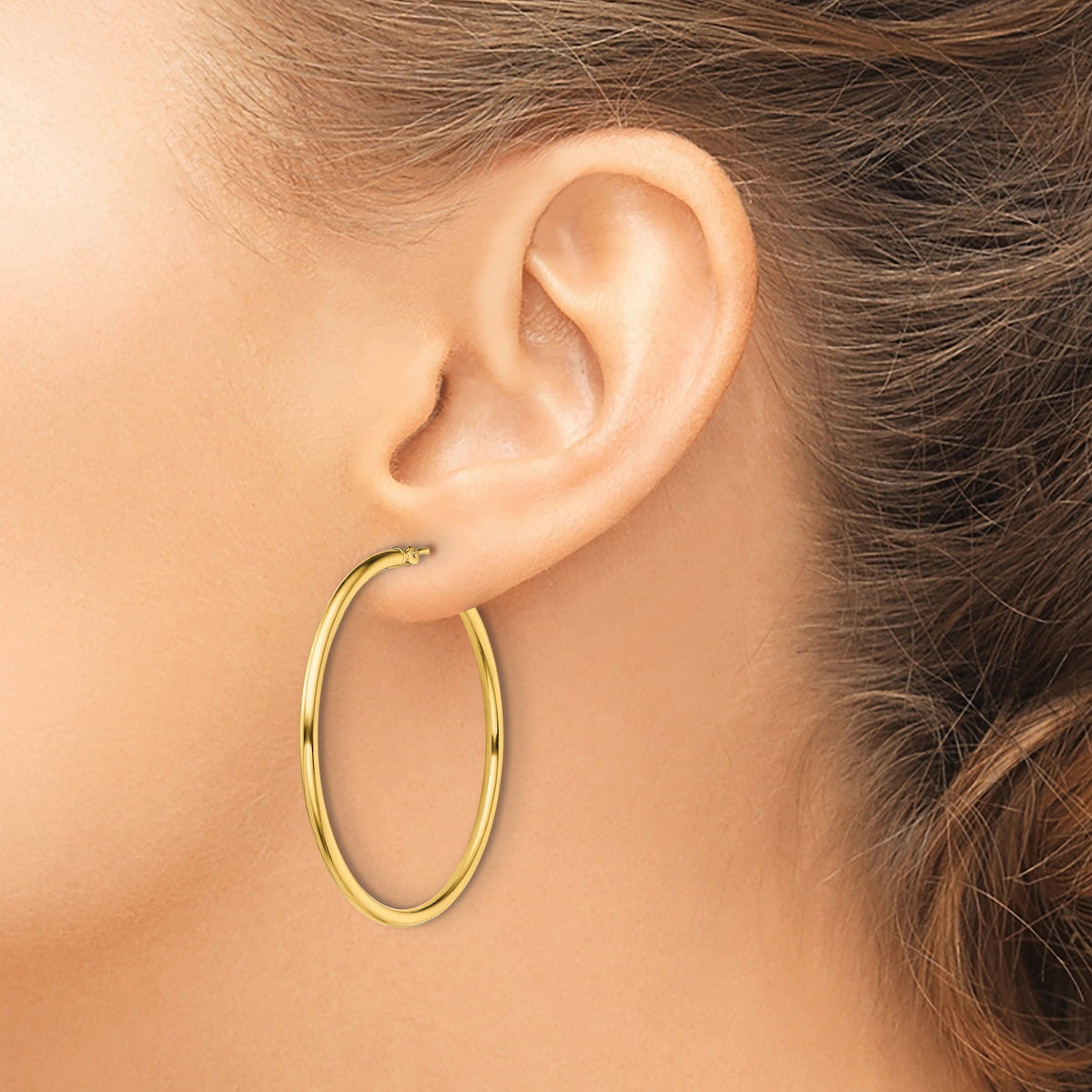 Classic 2mm gold-tone sterling silver hoop earrings, 40 mm — lifestyle view