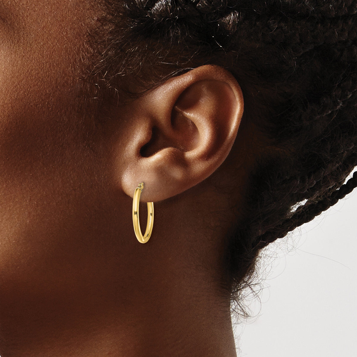 Classic 2mm gold-tone sterling silver hoop earrings, 20 mm — lifestyle view
