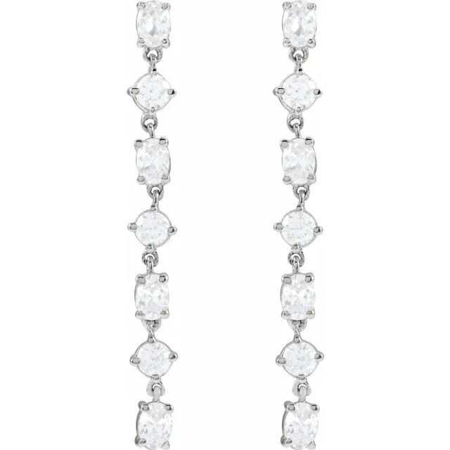 Front view of long alternating oval and round lab-grown diamond dangle earrings in rhodium-plated 14K white gold