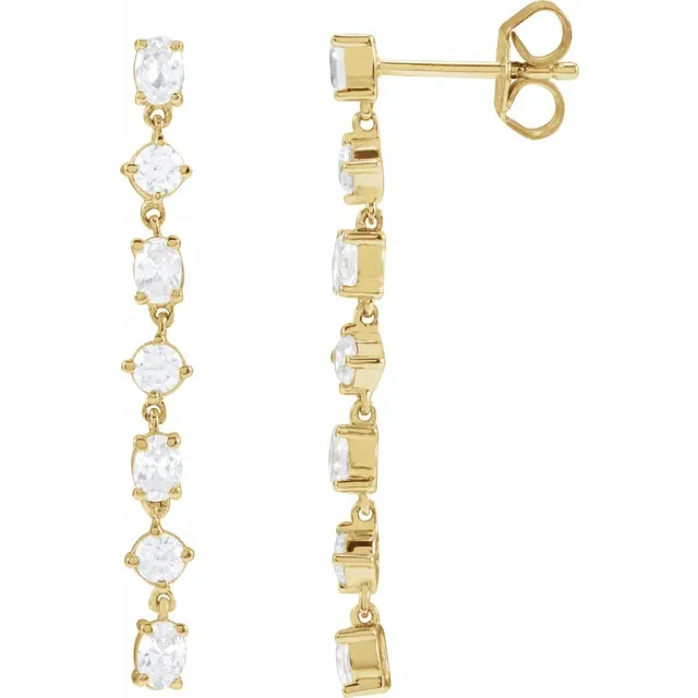 Front and side view of alternating oval and round lab-grown diamond dangle earrings in 14K yellow gold
