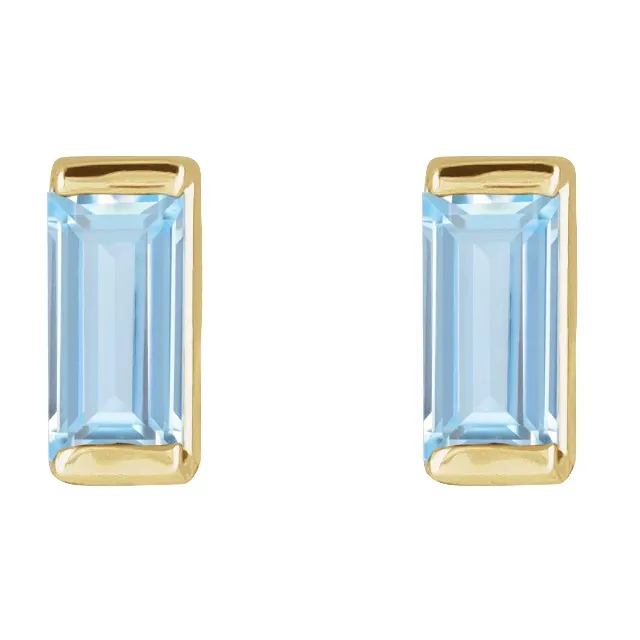 Lab-grown aqua sapphire baguette stud earrings in 14K yellow gold, front view