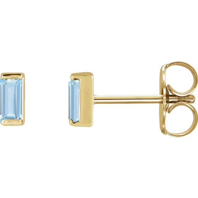 Lab-grown aqua sapphire baguette stud earrings in 14K yellow gold, side view