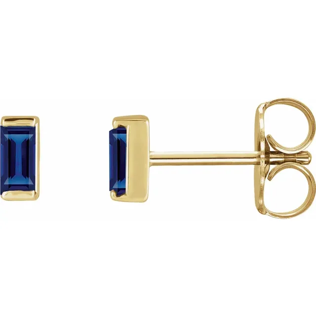 Lab-grown blue sapphire baguette stud earrings in 14K yellow gold, side view