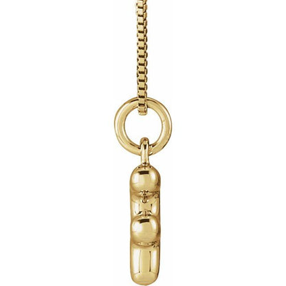 Bubble initial F necklace in yellow metal, side view