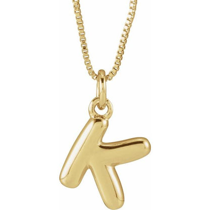 Bubble initial K necklace in yellow metal, front view