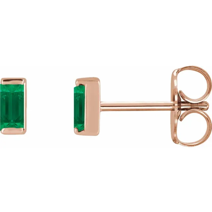 Lab-grown emerald baguette stud earrings in 14K rose gold, side view