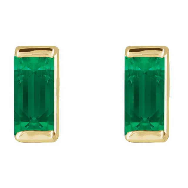 Lab-grown emerald baguette stud earrings in 14K yellow gold, front view