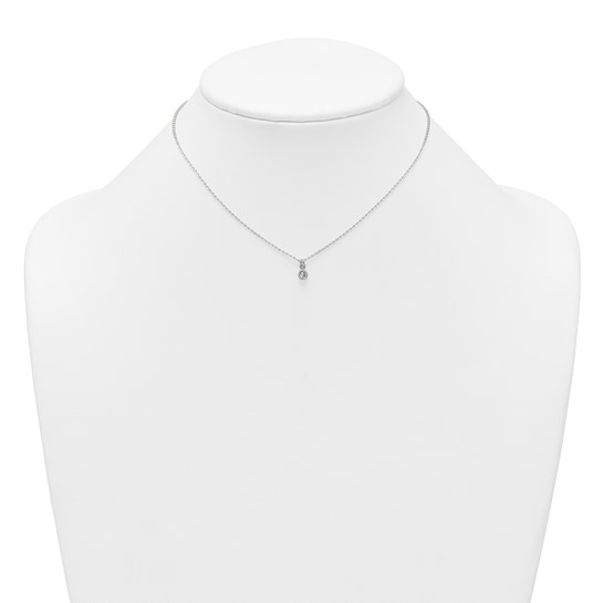 Children’s white cubic zirconia necklace shown on display bust
