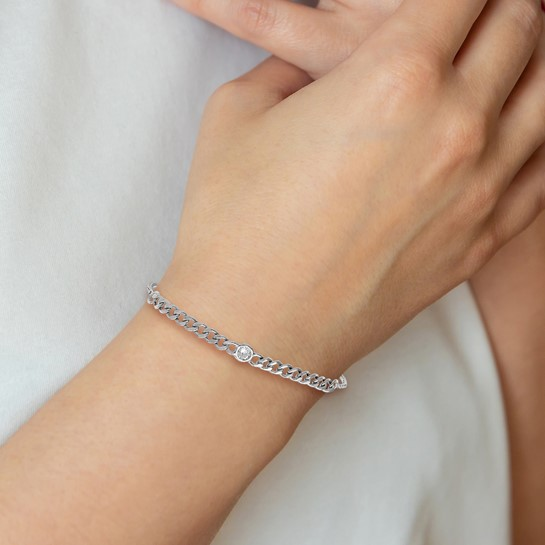 Rhodium-plated sterling silver CZ curb-link bolo bracelet worn on the wrist