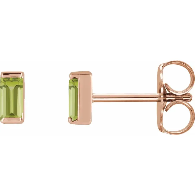 Natural peridot baguette stud earrings in 14K rose gold, side view
