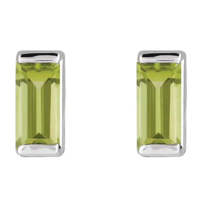 Natural peridot baguette stud earrings in white metal, front view