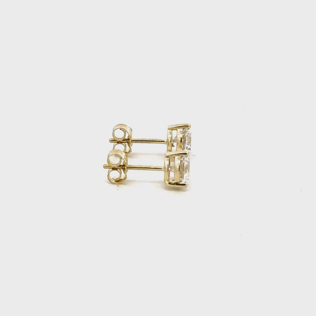 2 CTW round lab-grown diamond stud earrings in yellow gold video
