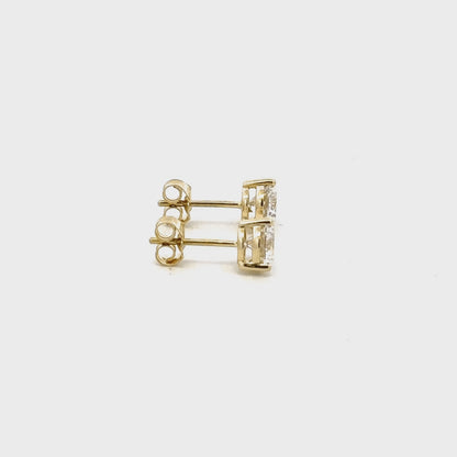 2 CTW round lab-grown diamond stud earrings in yellow gold video