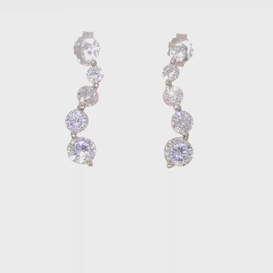 Sterling silver graduated cubic zirconia journey drop earrings video