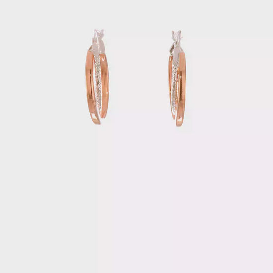 Rose-tone twisted oval sterling silver hoop earrings video
