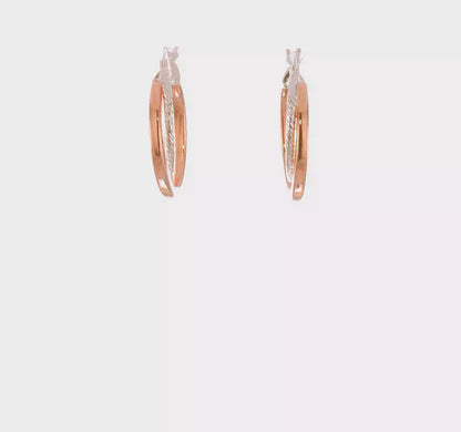 Rose-tone twisted oval sterling silver hoop earrings video