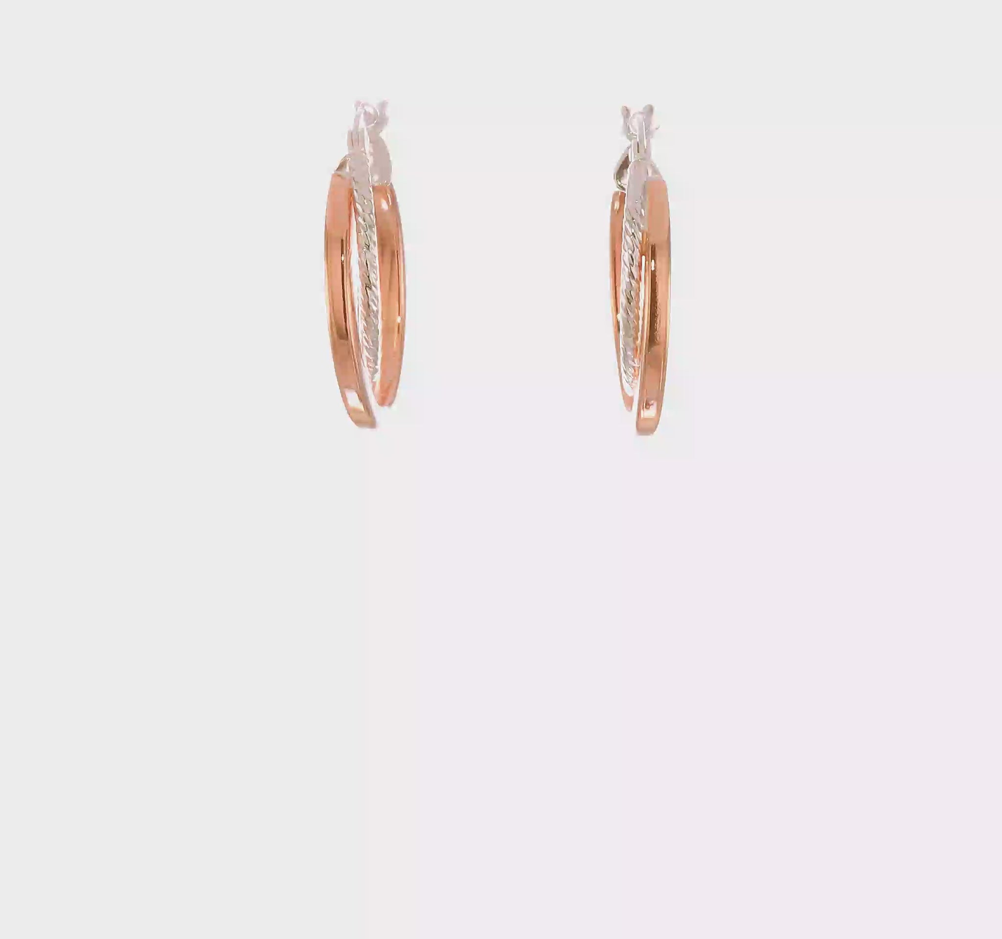 Rose-tone twisted oval sterling silver hoop earrings video