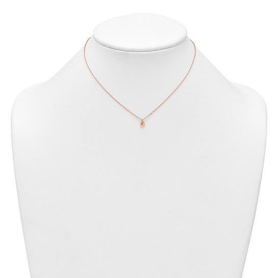 Rose-tone heart children's necklace shown on a display bust