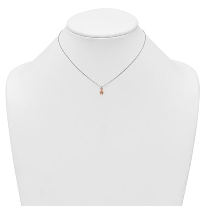 Rose-tone CZ star children's necklace shown on a display bust
