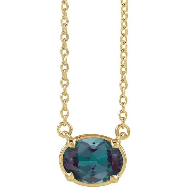 Front view of oval lab-grown alexandrite necklace in 14K yellow gold vermeil