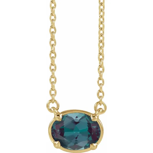 Front view of oval lab-grown alexandrite necklace in 14K yellow gold vermeil