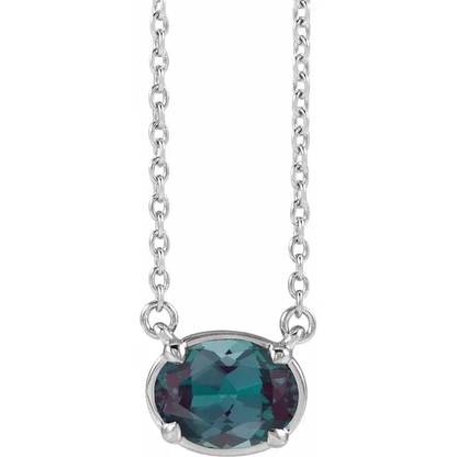 Front view of oval lab-grown alexandrite necklace in sterling silver
