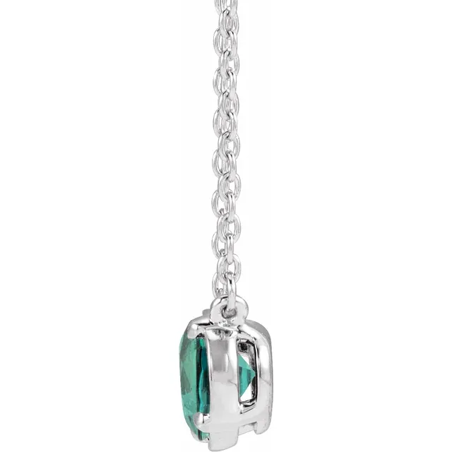 Side view of oval lab-grown alexandrite necklace in sterling silver