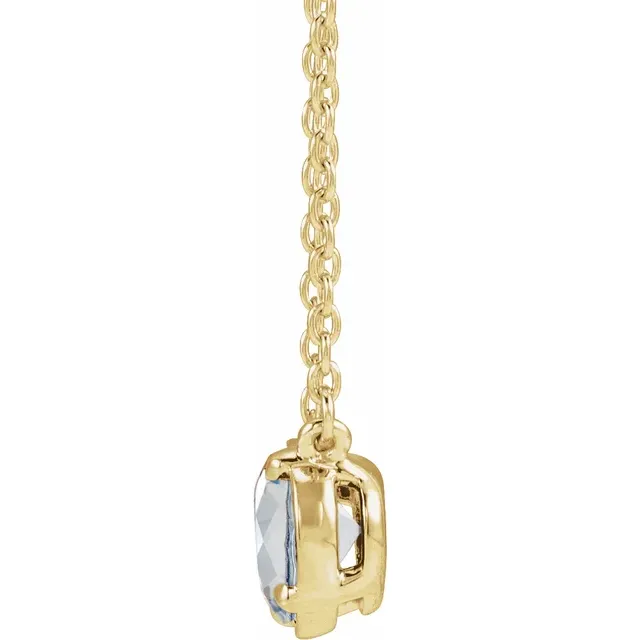 Side view of oval lab-grown diamond necklace in 14K yellow gold vermeil