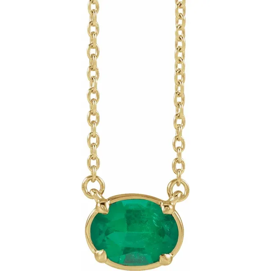Front view of oval lab-grown emerald necklace in 14K yellow gold vermeil