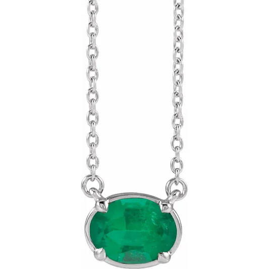 Front view of oval lab-grown emerald necklace in sterling silver