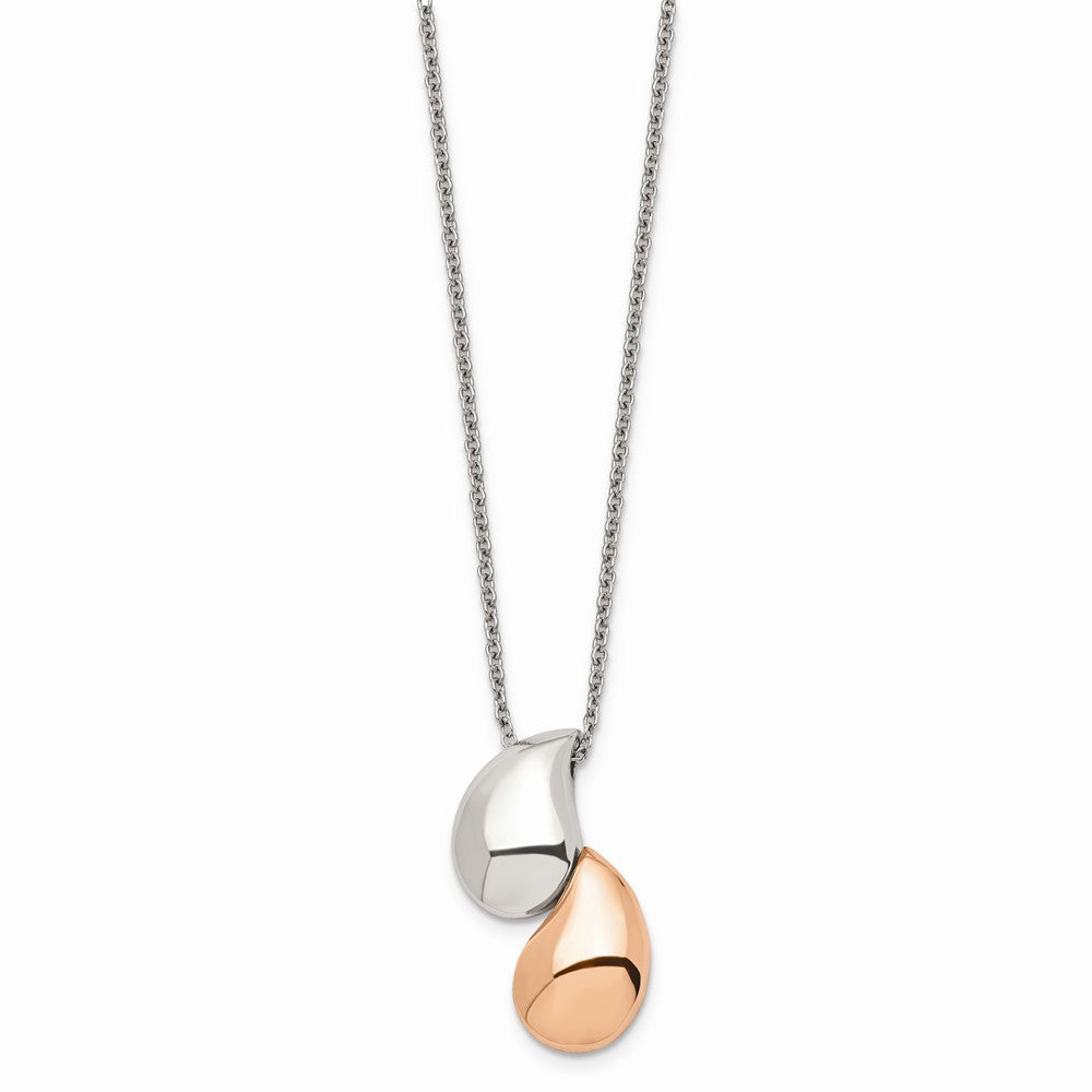 Two-tone teardrop pendant necklace shown on display