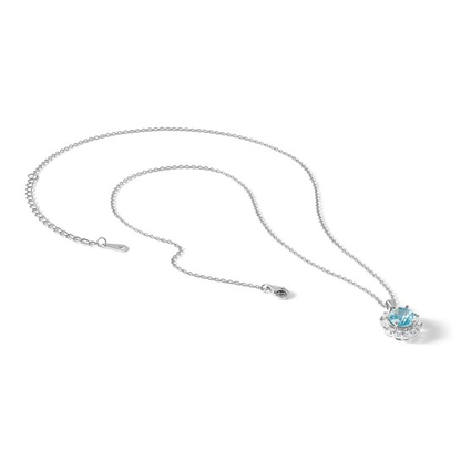 Sterling silver aqua-blue and white cubic zirconia oval halo necklace with chain and extender shown