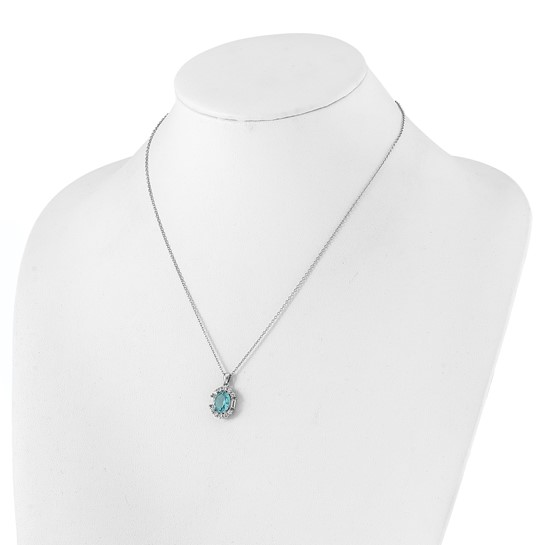 Sterling silver aqua-blue and white cubic zirconia oval halo necklace shown on display bust