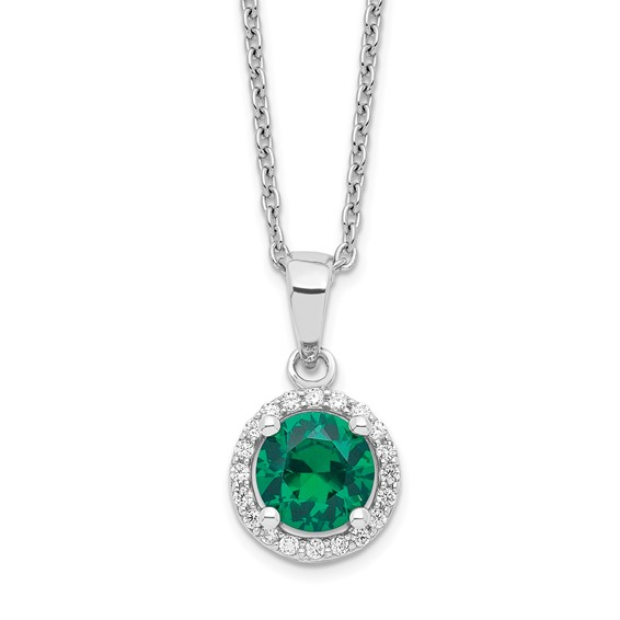Close-up of sterling silver green and white cubic zirconia halo necklace