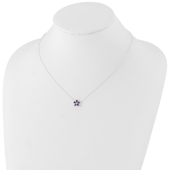 Sterling silver purple cubic zirconia flower necklace shown on display bust