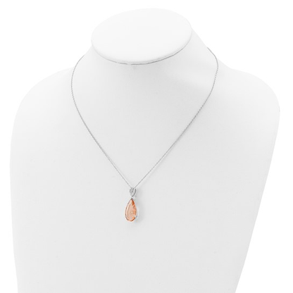Sterling silver simulated morganite teardrop necklace shown on display bust