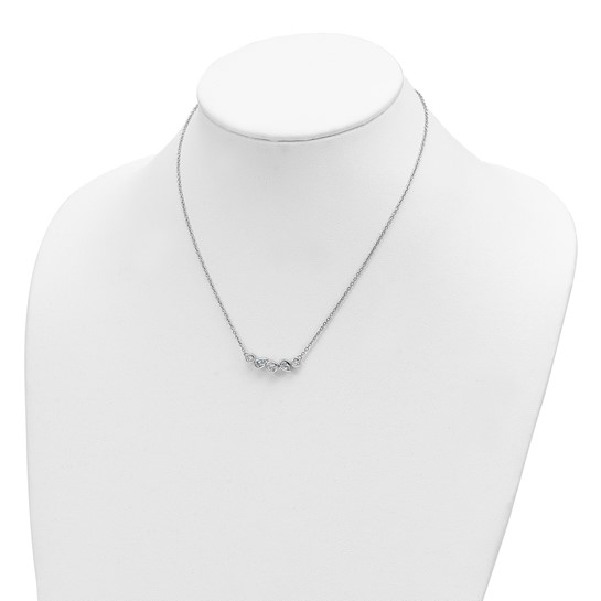 Sterling silver sky-blue topaz and cubic zirconia necklace shown on display bust