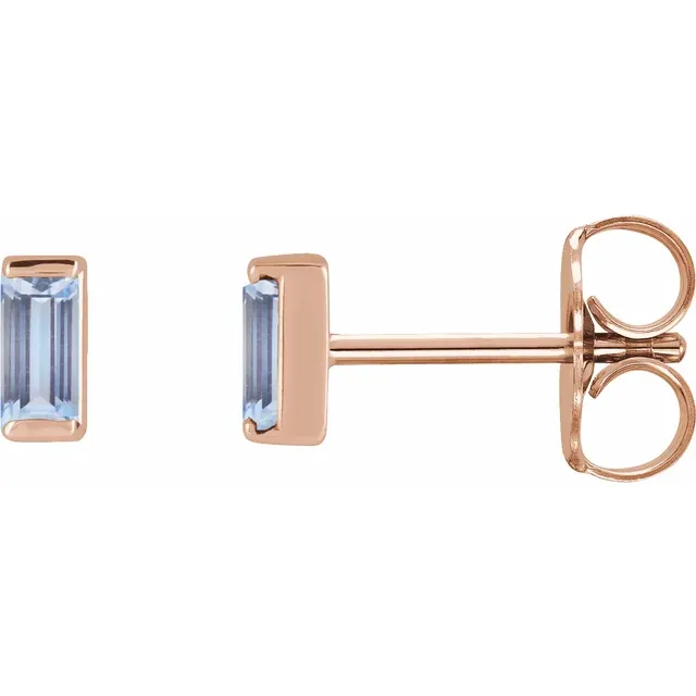 Natural tanzanite baguette stud earrings in 14K rose gold, side view