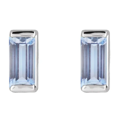 Natural tanzanite baguette stud earrings in white metal, front view