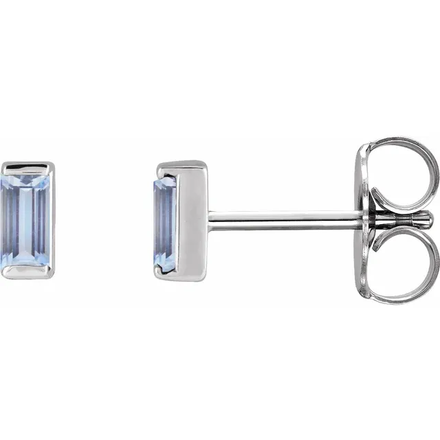 Natural tanzanite baguette stud earrings in white metal, side view