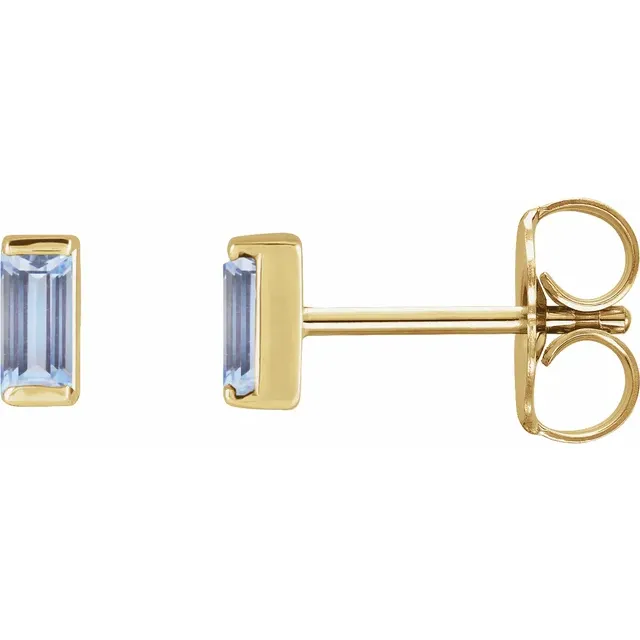 Natural tanzanite baguette stud earrings in 14K yellow gold, side view