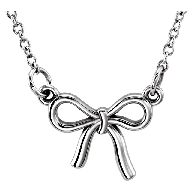 Tiny Posh knotted bow necklace in sterling silver, front view