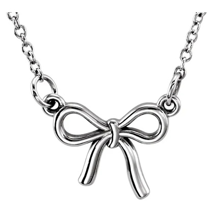 Tiny Posh knotted bow necklace in sterling silver, front view